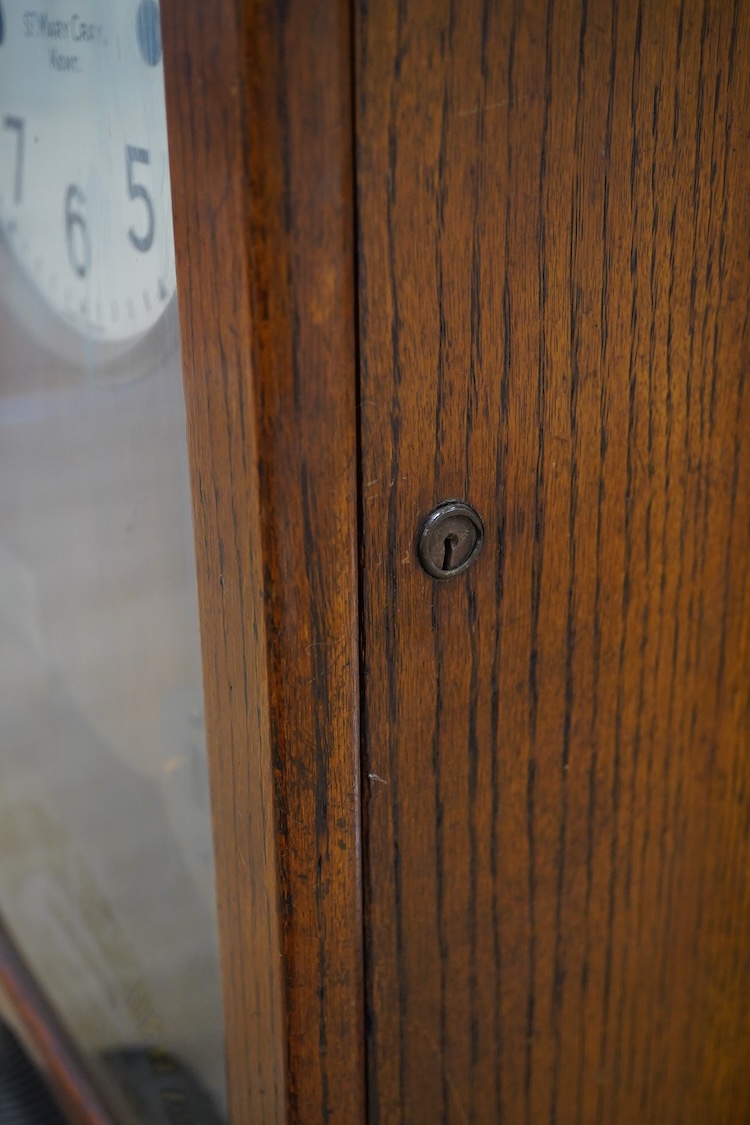 A National Time Recorder Co. Ltd. clocking in clock, 109cm high